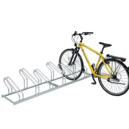 Cykelstativ med en gul cykel parkeret i stativet
